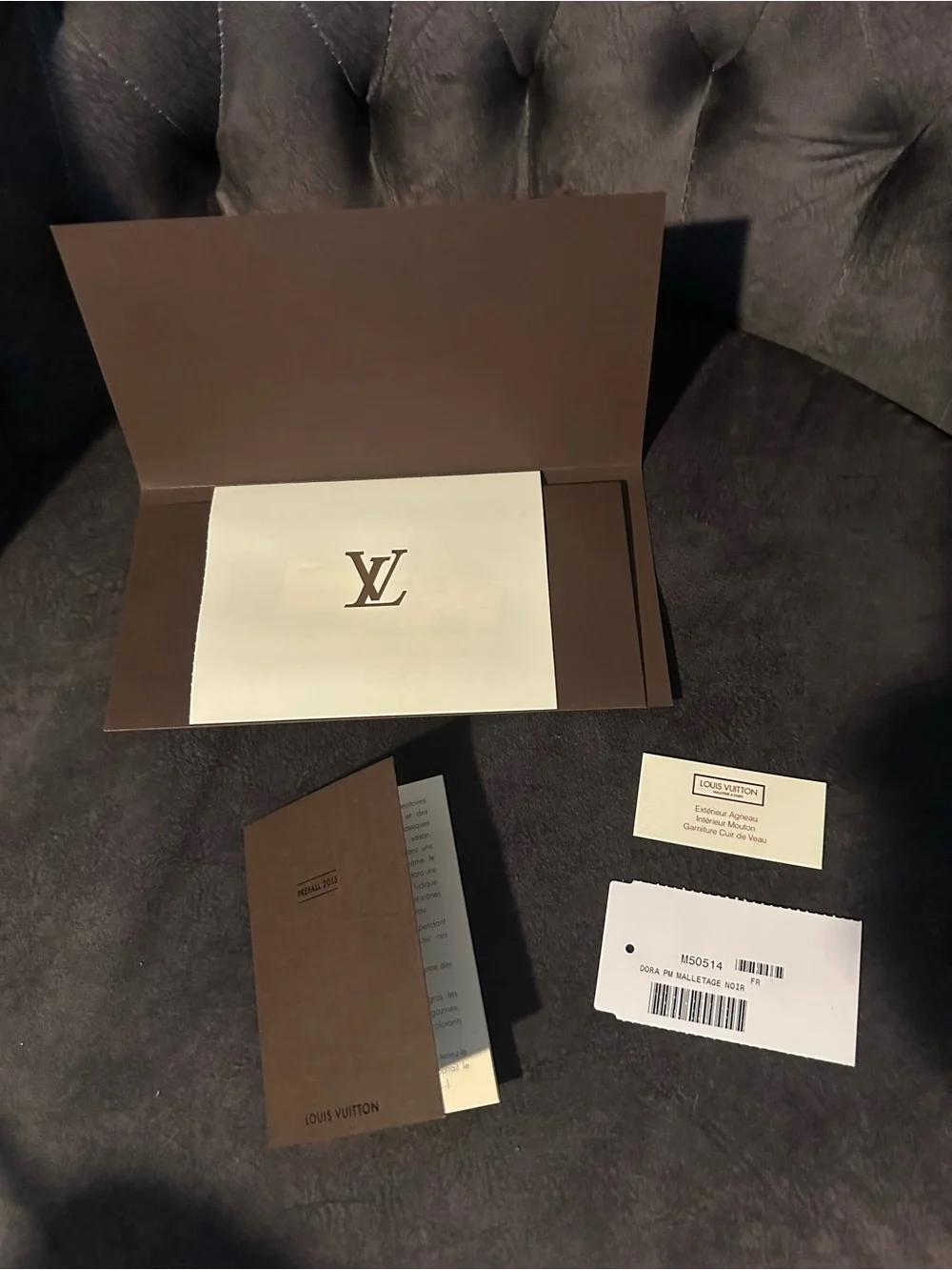 Louis Vuitton Black Dora PM Malletage